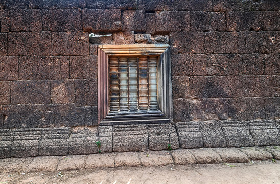 art of ancient asian baluster on window frame temple Angkorian sites in Cambodia Siem Reap, Cambodia
