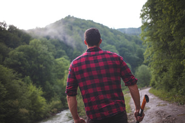 Handsome Strong Young Man in Plaid Shirt