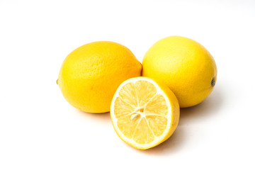 Collection of fresh yellow lemons isolated on white background.