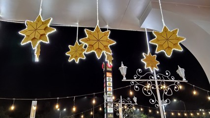 Mumbai, Maharastra/India- December 18 2019: Decorated stars hanging from the ceiling. Christmas celebration at a public club.