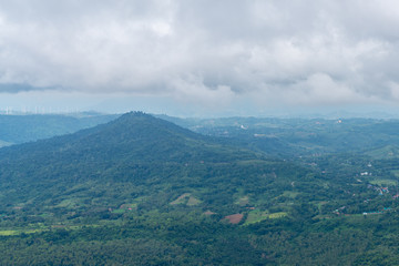 beautiful blue sky high peak mountains mist fog wildlife green forest at Khao Koh, Phu Tub Berk, Phetchabun, Thailand  guiding idea long weekend for backpacker camping campfire relaxing hiking