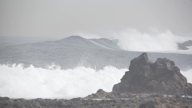 Waves breaking on a rocky shore