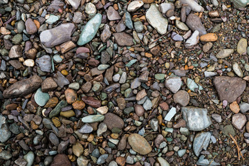 The texture of a shallow river stone. Pebble Background Image