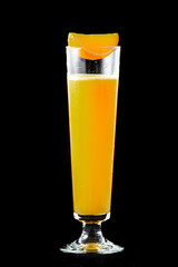 Freshly squeezed orange juice in a glass.