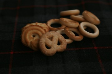 Cookies and barns to tea and coffee against a dark background