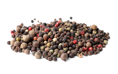 Mix of different pepper grains isolated on white