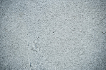 Texture of an old wall covered with paint. Background image of a worn paint coated surface