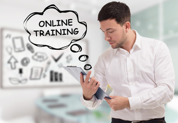 Business, technology, internet and network concept. The young businessman comes to mind the keyword: Online training