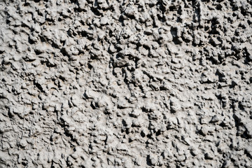 Texture photo of white rough concrete plaster