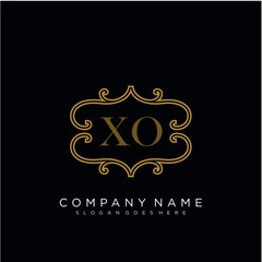 Initial letter XO logo luxury vector mark, gold color elegant classical 