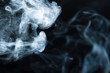 Fototapeta premium Photo of a wisp of smoke on a dark background
