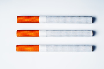 Close up of a smoking cigarettes . cigarette filter tubes