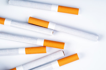 Close up of a smoking cigarettes . cigarette filter tubes