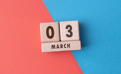 March 3 written with wooden blocks