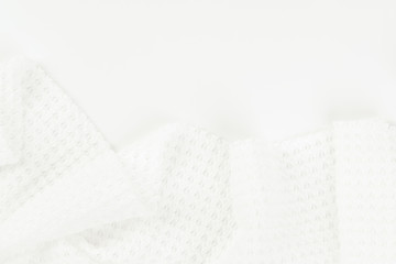 White textile. Copy space. Flat lay, top view plaid. Copy space. Flat lay, top view