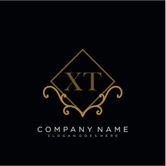 Initial letter XT logo luxury vector mark, gold color elegant classical 