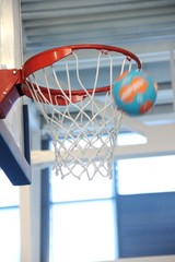 basketball hoop and net on blue background