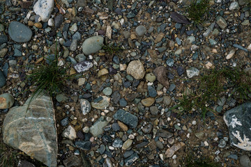 The texture of a shallow river stone. Pebble Background Image