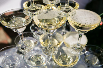 Hill of glasses with a sparkling and white smoke