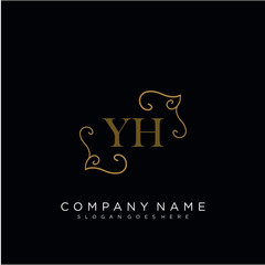 Fototapeta na wymiar Initial letter YH logo luxury vector mark, gold color elegant classical 