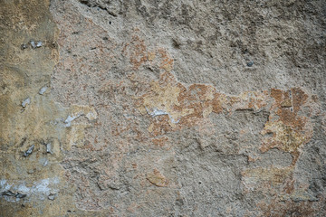 Texture of an old wall covered with paint. Background image of a worn paint coated surface
