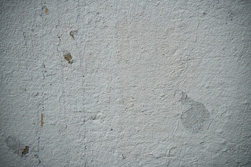 Texture of an old wall covered with paint. Background image of a worn paint coated surface