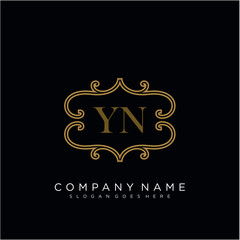 Initial letter YN logo luxury vector mark, gold color elegant classical 