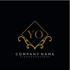 Initial letter YO logo luxury vector mark, gold color elegant classical 