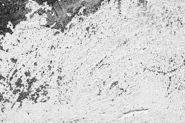 Texture of a concrete wall with cracks and scratches which can be used as a background