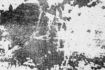 Texture of a concrete wall with cracks and scratches which can be used as a background