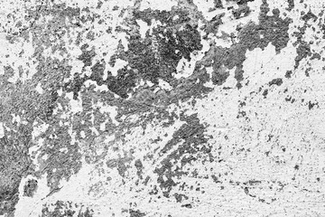 Texture of a concrete wall with cracks and scratches which can be used as a background