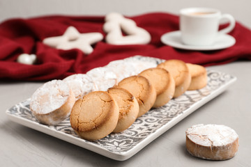 Tasty homemade cookies on light grey table