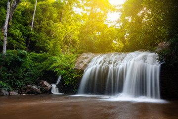 Beautiful waterfall with sunlight in jungle, Haew Suwat Waterfall