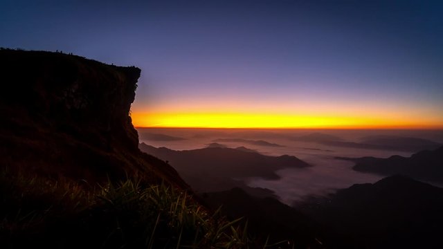 Time lapse sunrise and sea of mist, Beautiful landscape nature in the morning of Phu Chi fa National Park. Chiang Rai Province, Thailand