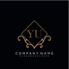 Initial letter YU logo luxury vector mark, gold color elegant classical 