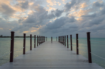 Fototapeta premium Wooden pier at Sunset Ocean view Cuba