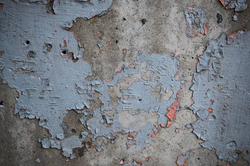 Texture of an old wall covered with paint. Background image of a worn paint coated surface