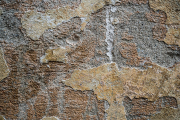 Texture of an old wall covered with paint. Background image of a worn paint coated surface