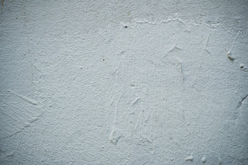 Texture of an old wall covered with paint. Background image of a worn paint coated surface