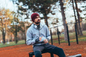portrait of young man jogger outdoors