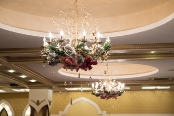 Christmas decorations on the Christmas tree. Christmas flower composition. 