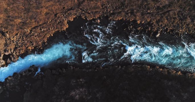 aerial shot of famous Iceland with its beautiful fascinating unique landscape, rivers, mountains, glaciers and waterfalls on a clear sunny day - great 4k shots for nature travel bloggers