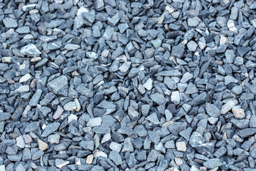 Black small road stone background, dark gravel pebbles stone texture seamless texture, granite,marble