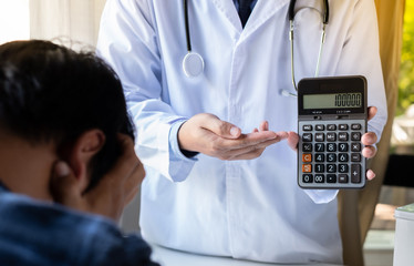Obraz na płótnie Canvas calculator on white background, concept for medical expenses