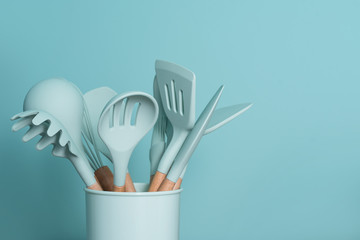 Kitchen utensils background with copyspace, home kitchen decor concept, kitchen tools, rubber...
