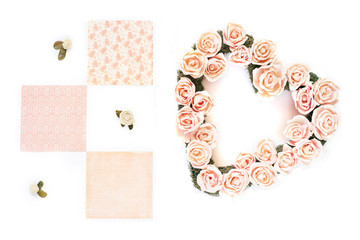 Coral flower heart on white background with notes.