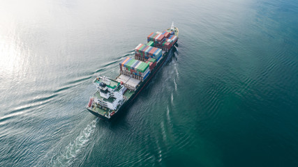 Large container ship at sea. Aerial top view of cargo container ship vessel import export container...