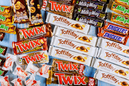 Chocolates assortment of chocolate sweets incorporated manufactured Toffifee, Milky way, Raffaello, snickers, Twix, Mars, hersheys