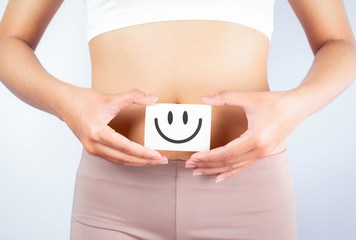 Women Stomach Health. Healthy Female With Beautiful Fit Slim Body  Holding White Card With Happy...