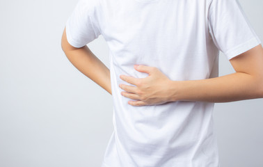 Men touch the bowel irritable Fluctuating intestine due to food poison with health concept on white background